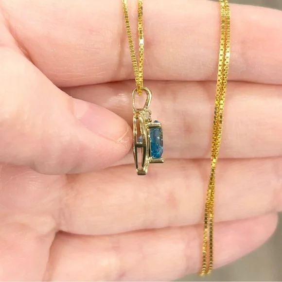 10K Swiss Blue Topaz heart cut cz petite elegant yellow gold open heart pendant - Picture 8 of 11